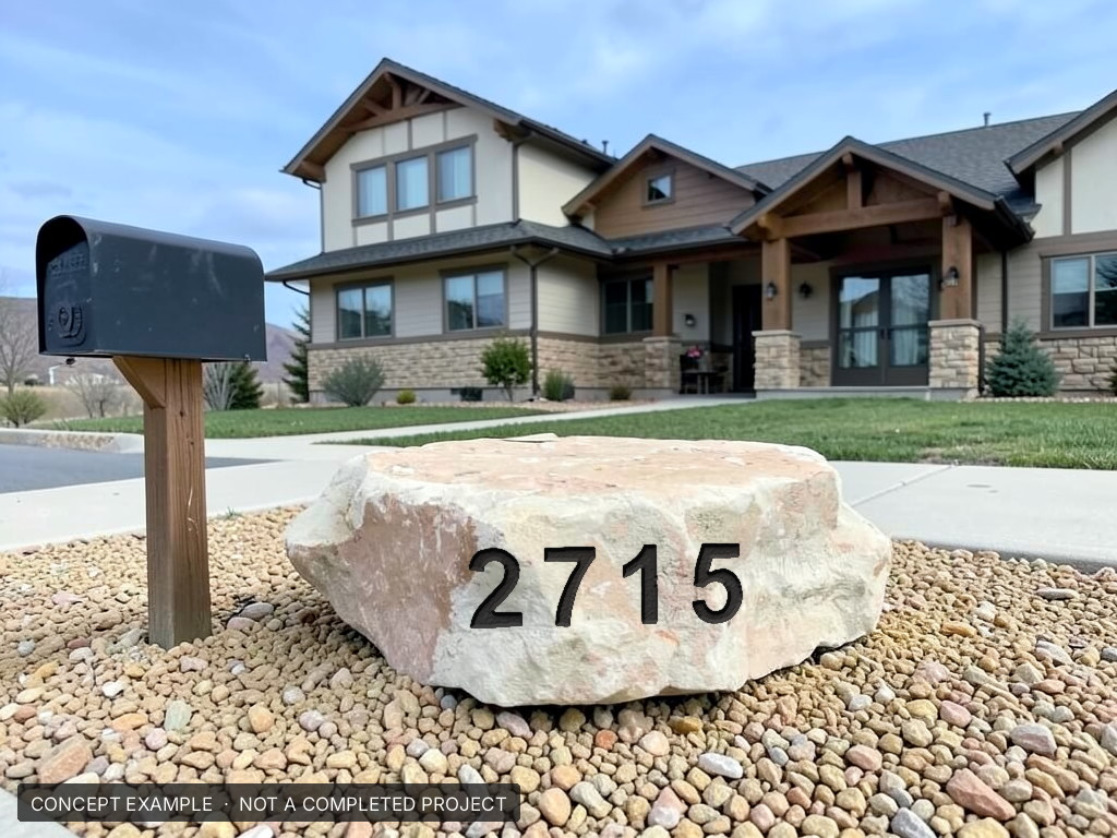 Custom address boulder, cream limestone - concept example rendering, not a completed Q Lawn project