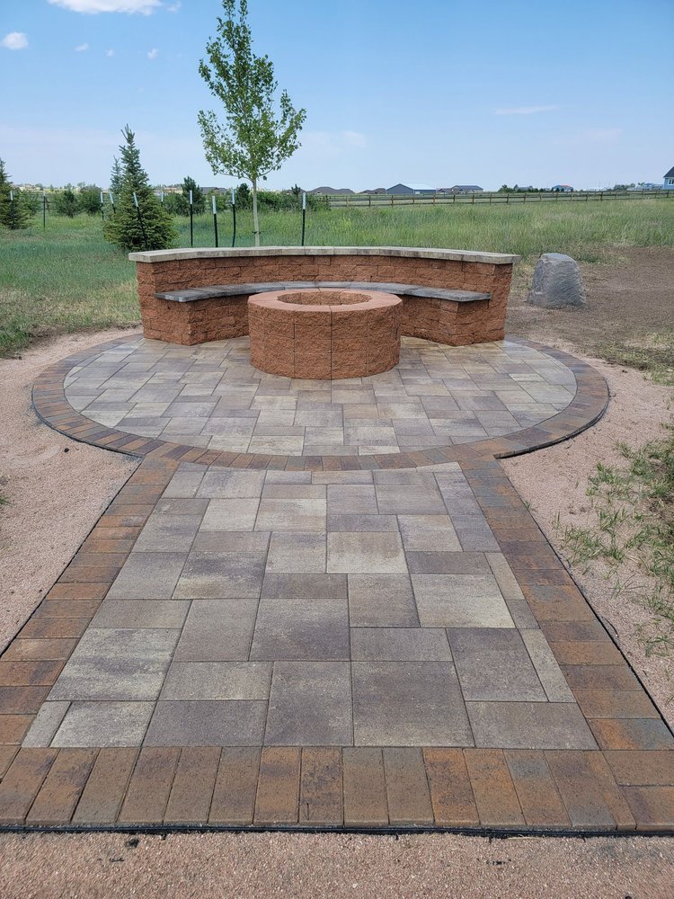 Paver patio with fire pit and curved seat wall, Cheyenne Wyoming