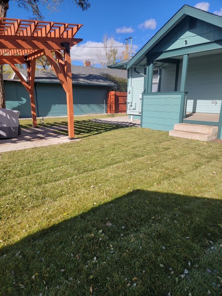 Backyard pergola over paver patio with new sod, Cheyenne Wyoming