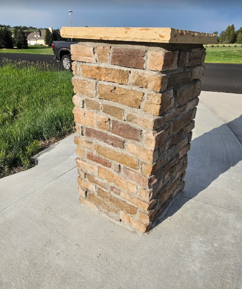 Close-up of a stone-veneer column with a cut natural-stone cap, Cheyenne, Wyoming
